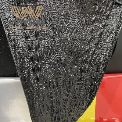 py145344437-black_faux_leather_crocodile_fabric_for_bags_selling_products_ready_to_ship.webp